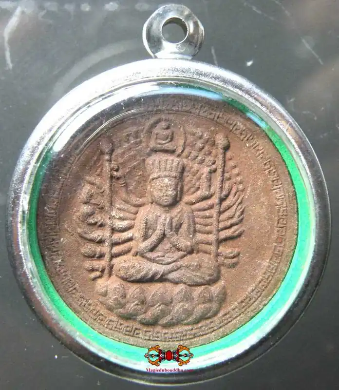 Amulet of Guan Yin with a thousand arms and the standing Buddha.