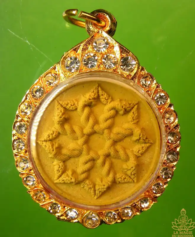 Intertwined Naga amulets - Wat Maniwong.