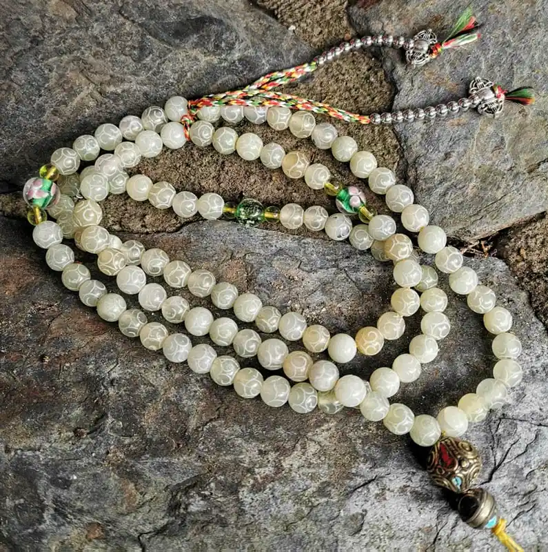 Tibetan jade mala rosary.