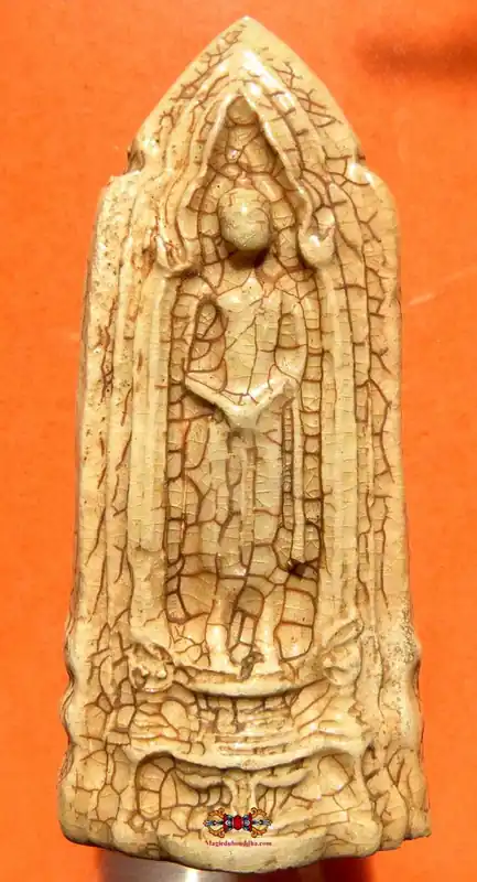 Ceramic votive tablet of the standing Buddha Phra Tawai Neth (Sunday Buddha).