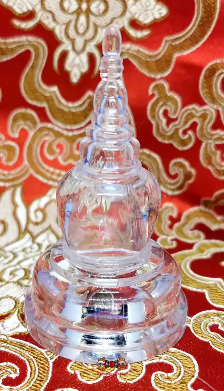 Small Buddhist Stupa reliquary in translucent acrylic.