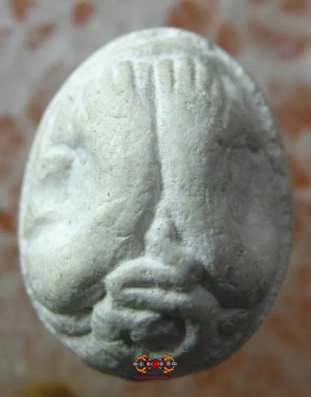 Thai Phra Pidta Look Aum white amulet - Wat Sakai.