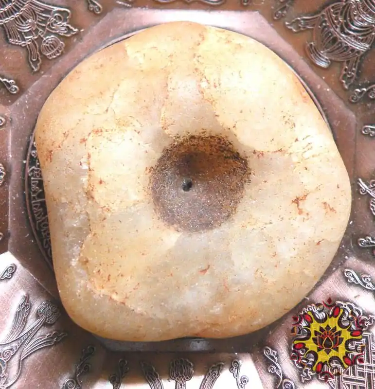 Lucky drilled stones from Nepal - antique loom weights.