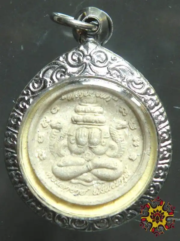 Thai amulet of the protective Buddha Phra Pidta and the monkey god Hanuman.
