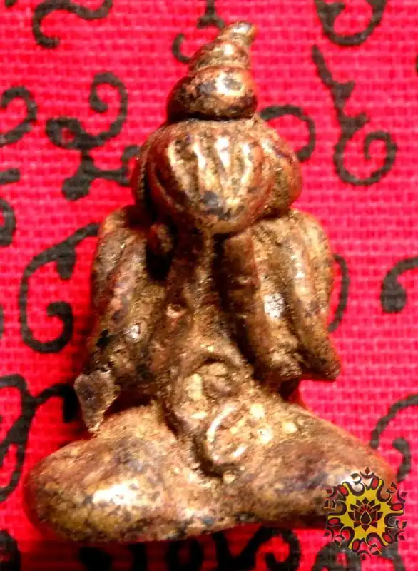Thai protective amulet of the Buddha Phra Pidta in bronze.