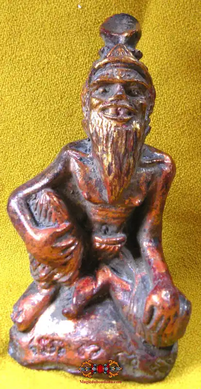 Antique red and gold statuette of a Lersi hermit.