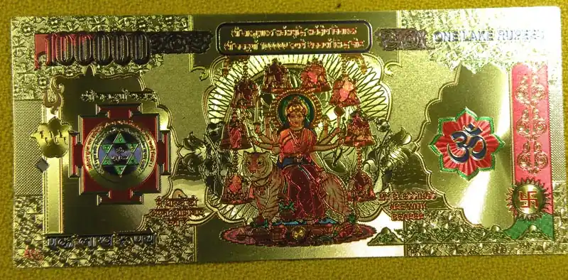 Magical golden note of 100,000 rupees of Goddess Durga.