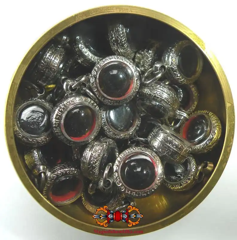 Met Rae Thai alchemical glass cabochon pendants.