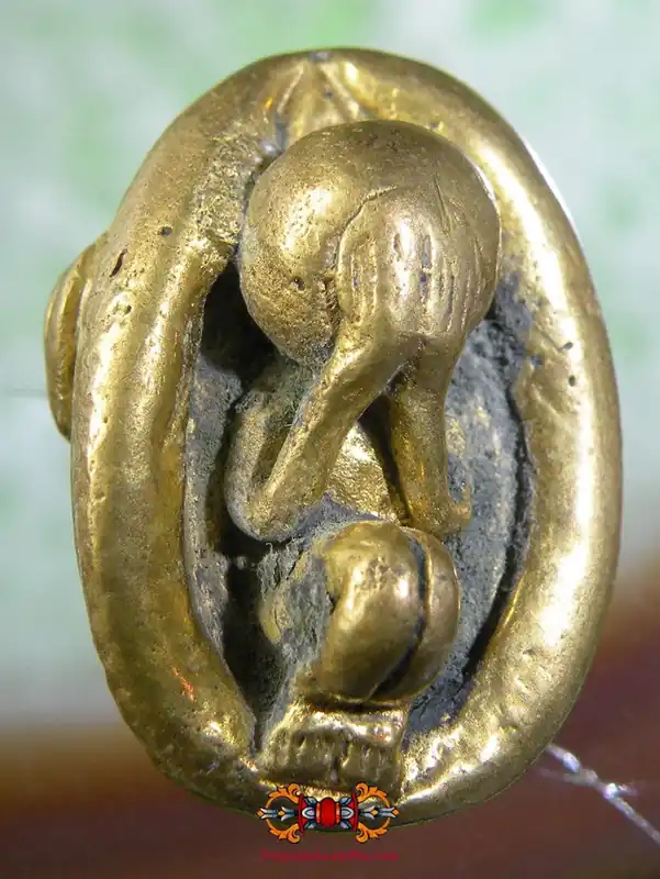 Curious amulet from Cambodia Phra Pidta Bia Gae.
