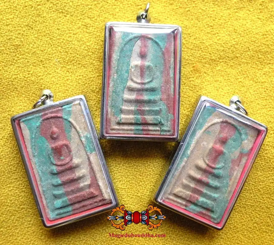 Large antique multi-colored Phra Somdej amulets.