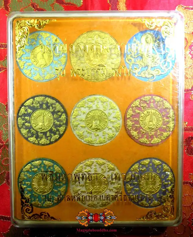 Collection of nine large Jatukham Rammathep amulets.