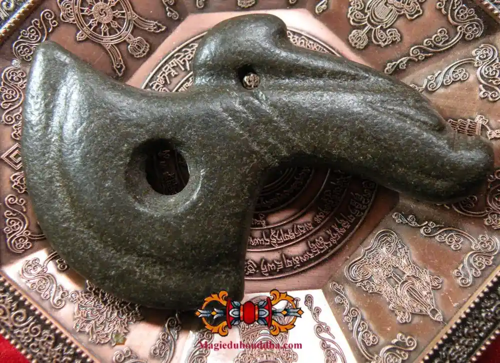 Tibetan votive hatchet talisman in magnetic black stone.