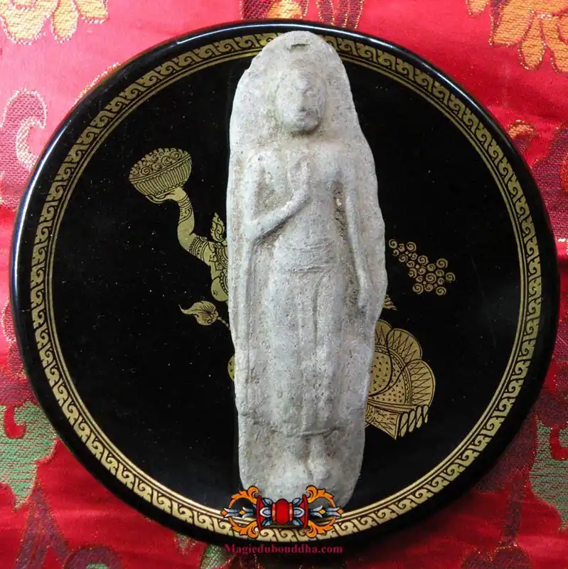 Large terracotta votive tablet of the standing Buddha.