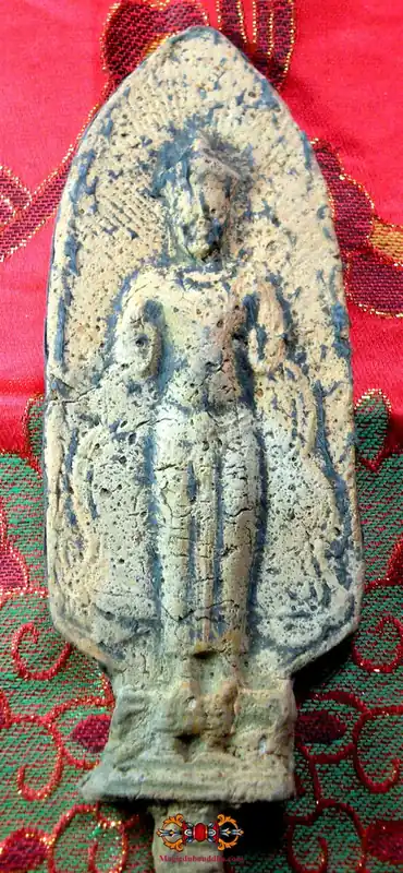 Large Thai votive tablet of the standing Buddha.