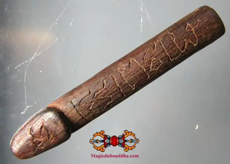 Ancient wooden carved palat kick amulet.