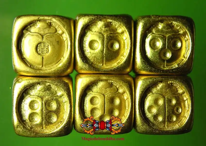 Chinese ladybug divination dice in gilded brass.