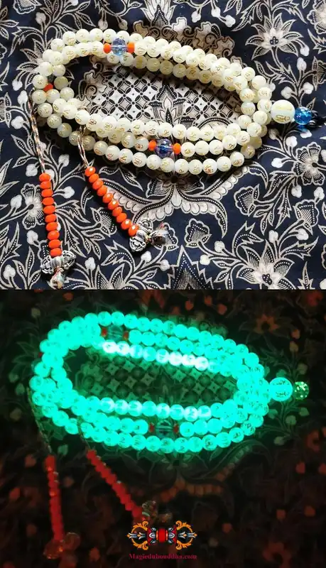 Buddhist mala rosary made of fluorescent Chinese sacred stone beads Ye Ming Zhu engraved with mantra.