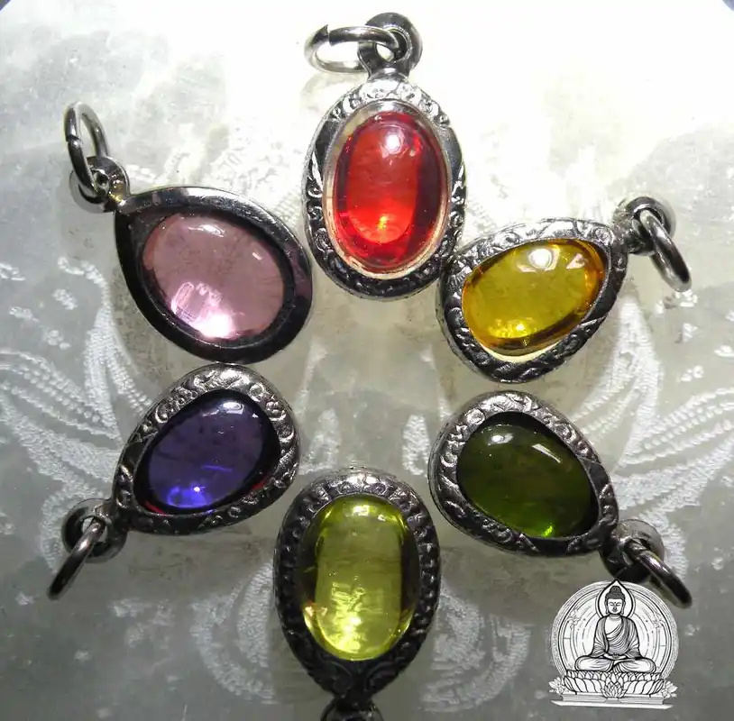 Pendants made of multi-colored sacred Naga crystals (Eye of the Nagas).