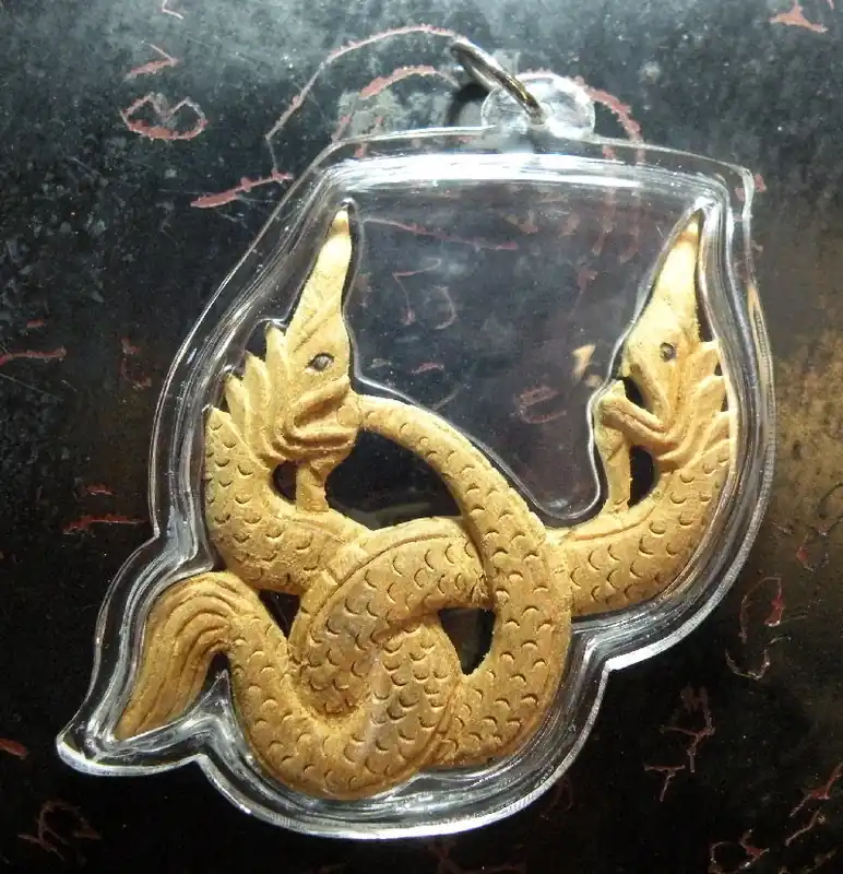 Large carved wooden Naga couple pendant - Wat Tham Chaïmongkol.