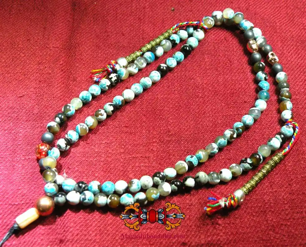 Beautiful Tibetan mala rosary in blue agate and skull beads.