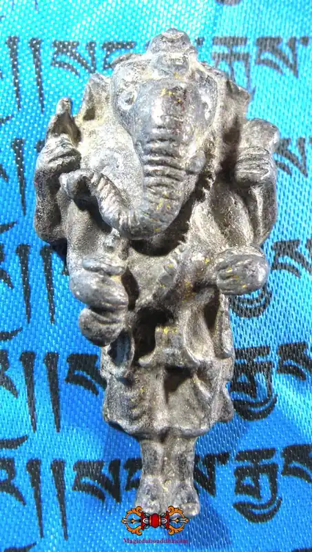 Cambodian amulet of standing Ganesh.