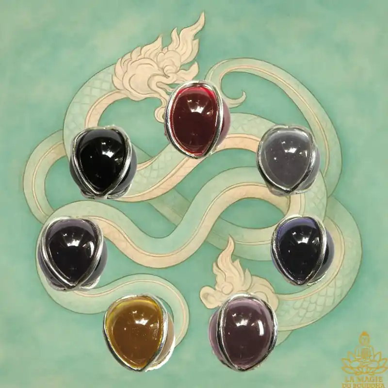 Multicolored Naga eye bead pendants mounted on silver.