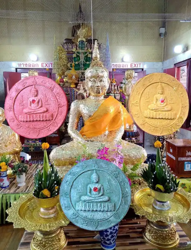 Collection of three Phra Pikanet / Luang Phor Pak Deng amulets - Wat Phra Mani.