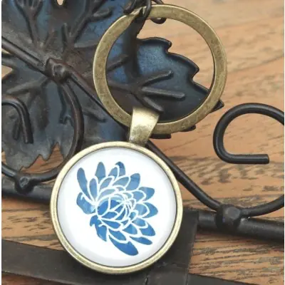 Porte Clés Fleur de Lotus bleue doré