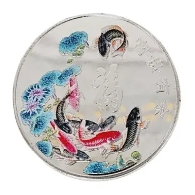 Amulette argentée Poissons carpes de la Réussite