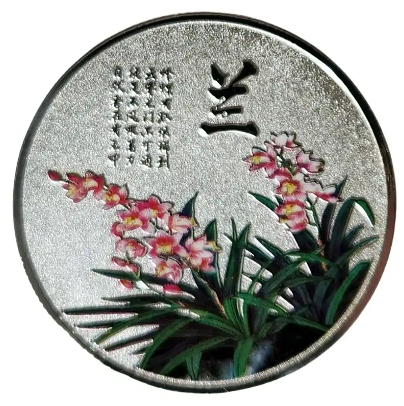 Amulette argentée Orchidées