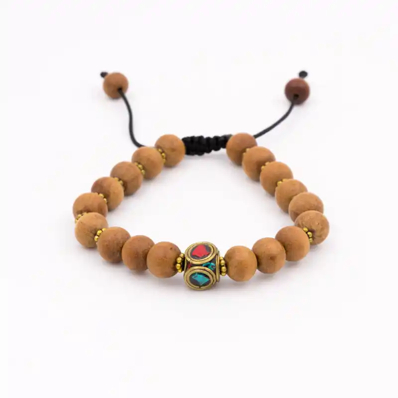 Bracelet en bois de santal et perle tibétaine