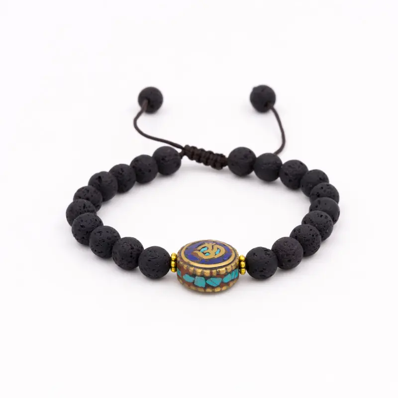 Bracelet en pierre de lave et perle tibétaine