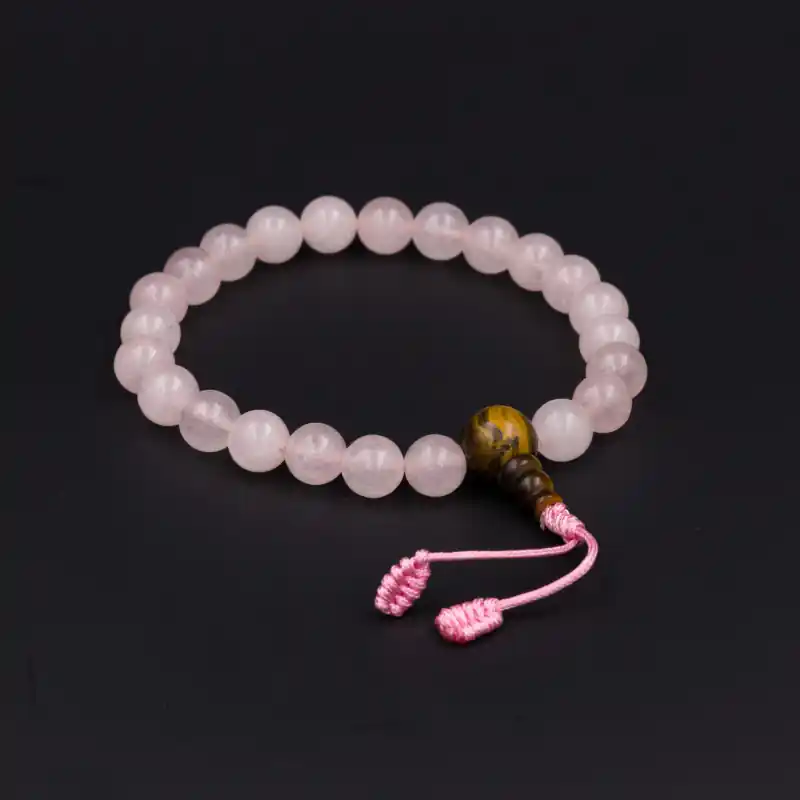 Bracelet mâlâ tibétain en perles de quartz rose