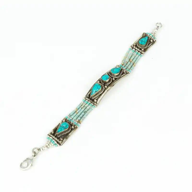 Bracelet tibétain incrusté de 3 pierres turquoises