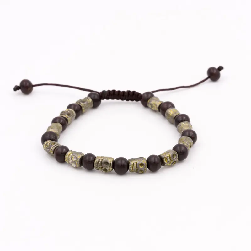 Bracelet mâla en bois avec tête de mort en laiton