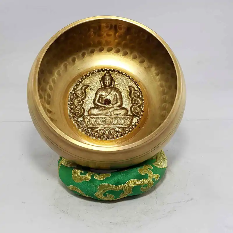 Bol chantant avec Bouddha en relief