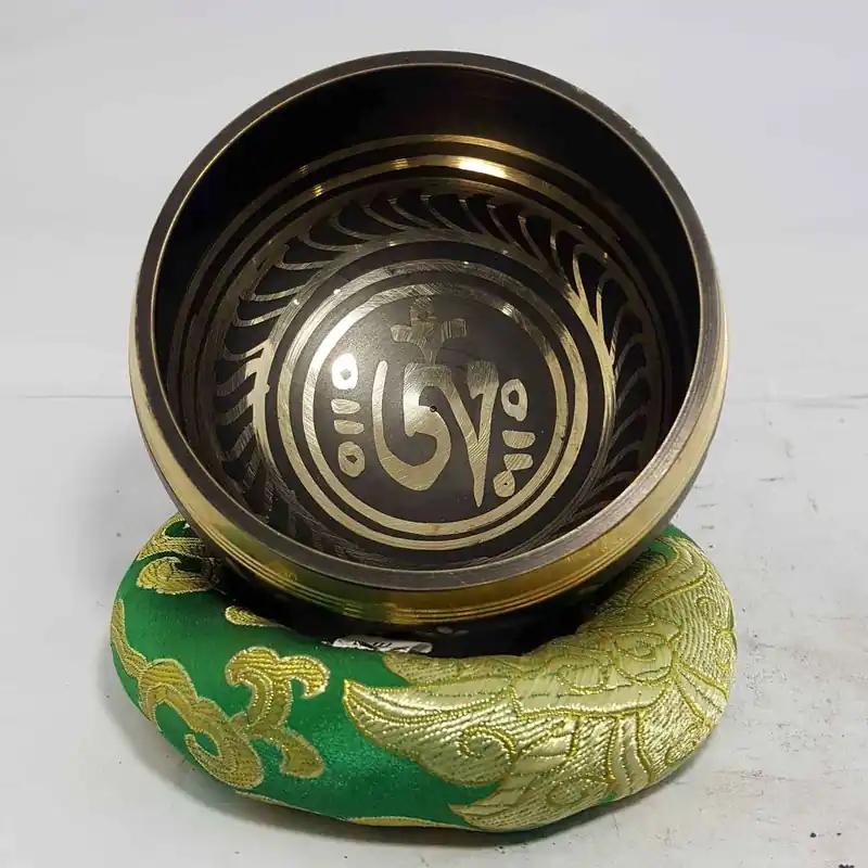 Om Singing Bowl Les bols chantants Om