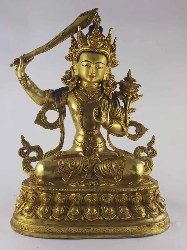 Statue de Manjushri en cuivre avec visage peint et base en double lotus