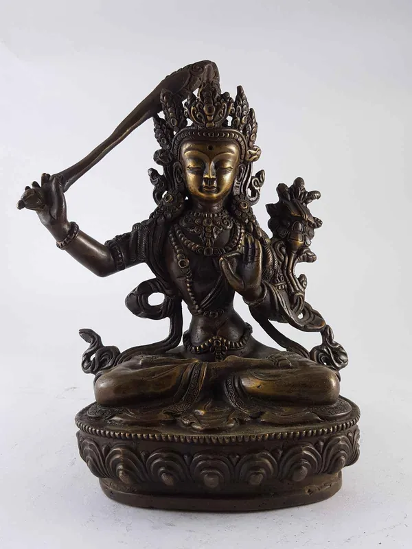 Statue antique en cuivre de Manjushree