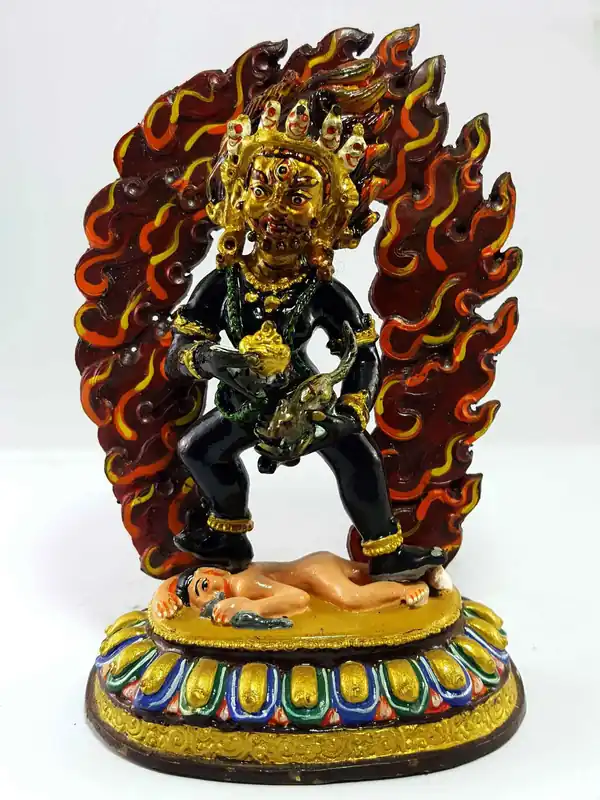 Statue Thangka en noir Jambala, finition colorée artisanale.
