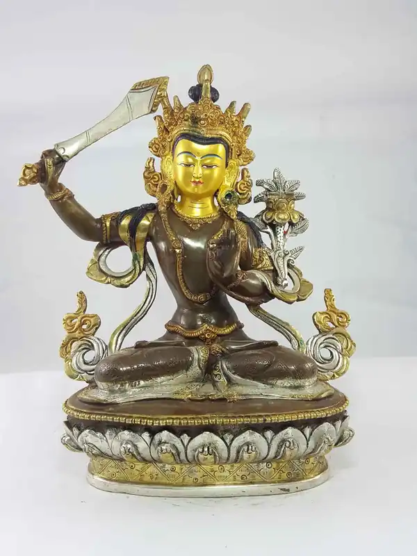 Statue de Manjushri en cuivre avec visage peint