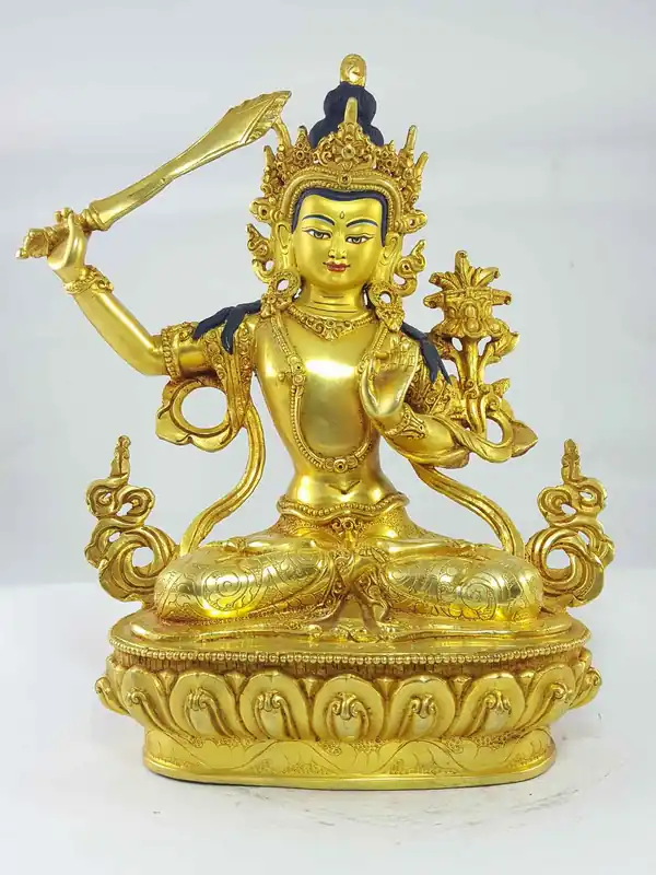 Statue tibétaine de Manjushree avec visage peint