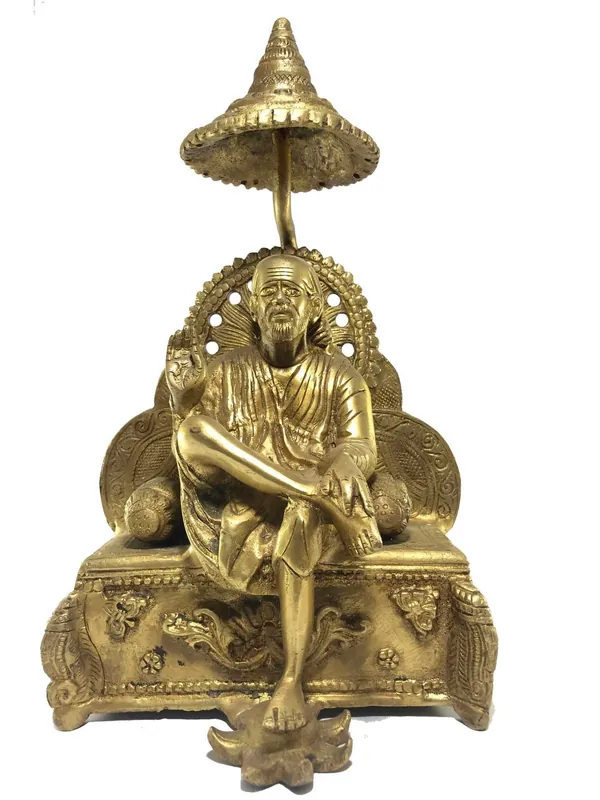Statue de Sai Baba sur un trône
