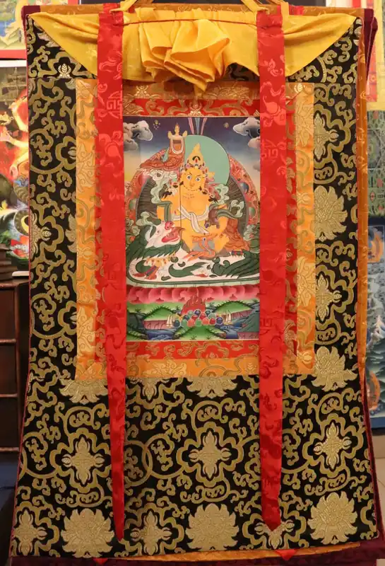 Thangka de Jambhala encadré en soie