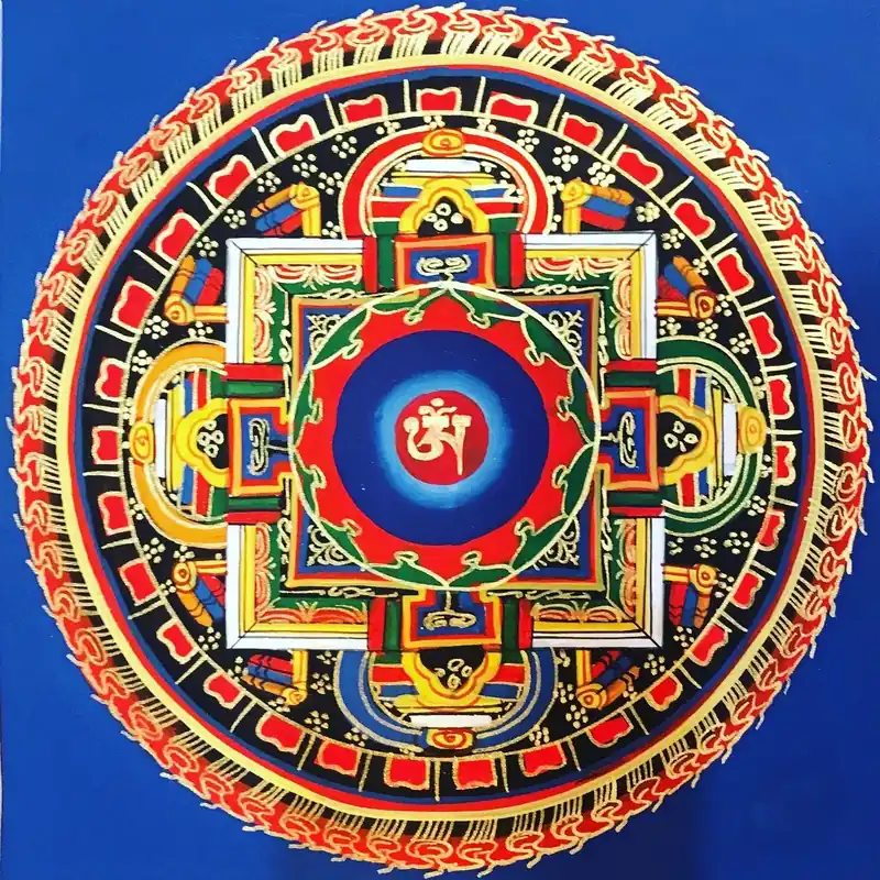 Om Mandala avec fond bleu