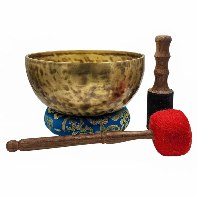Bol chantant artisanal en sept métaux bronzés