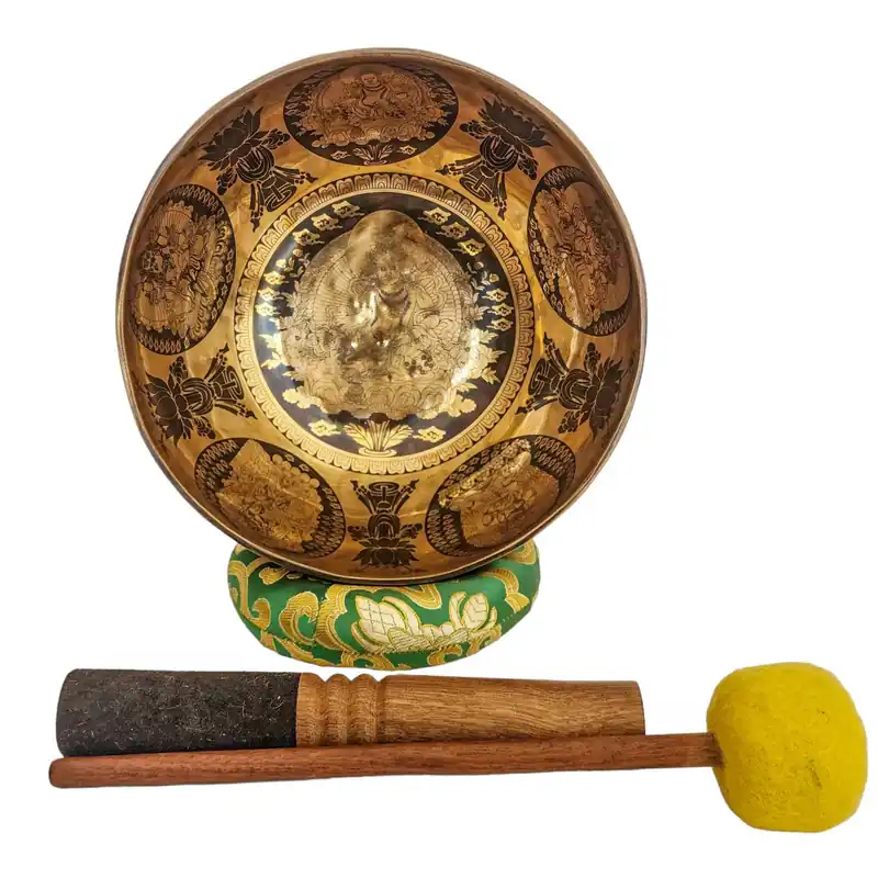 Bol chantant tibétain avec des gravures de Jambhala jaune