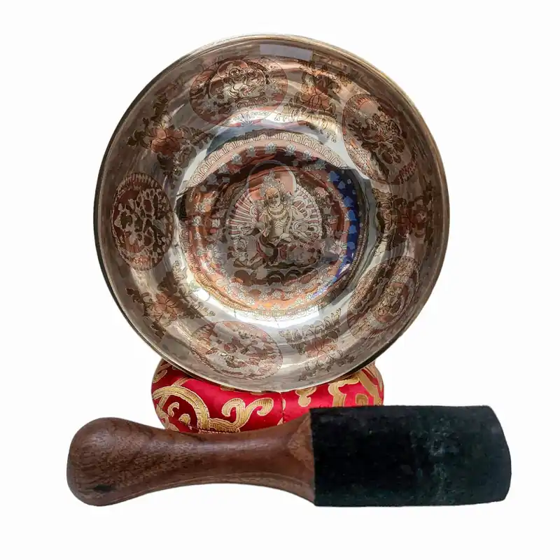 Bol chantant en jambati plaqué argent avec des sculptures de Jambhala