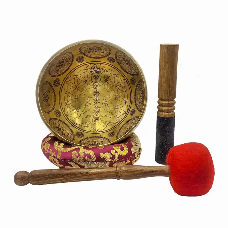 Sept bols chantants en bronze avec figure de yoga