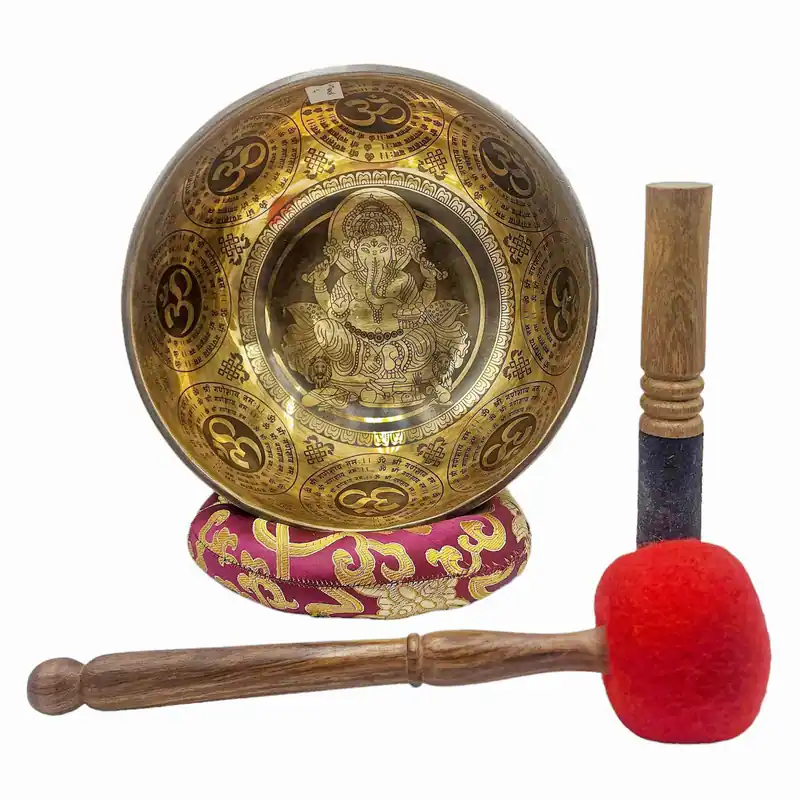 Sept bols chantants en bronze avec sculpture de Ganesh
